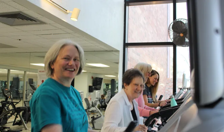  Eileen Eastridge (left) and her Livestrong class at the Littleton YMCA.